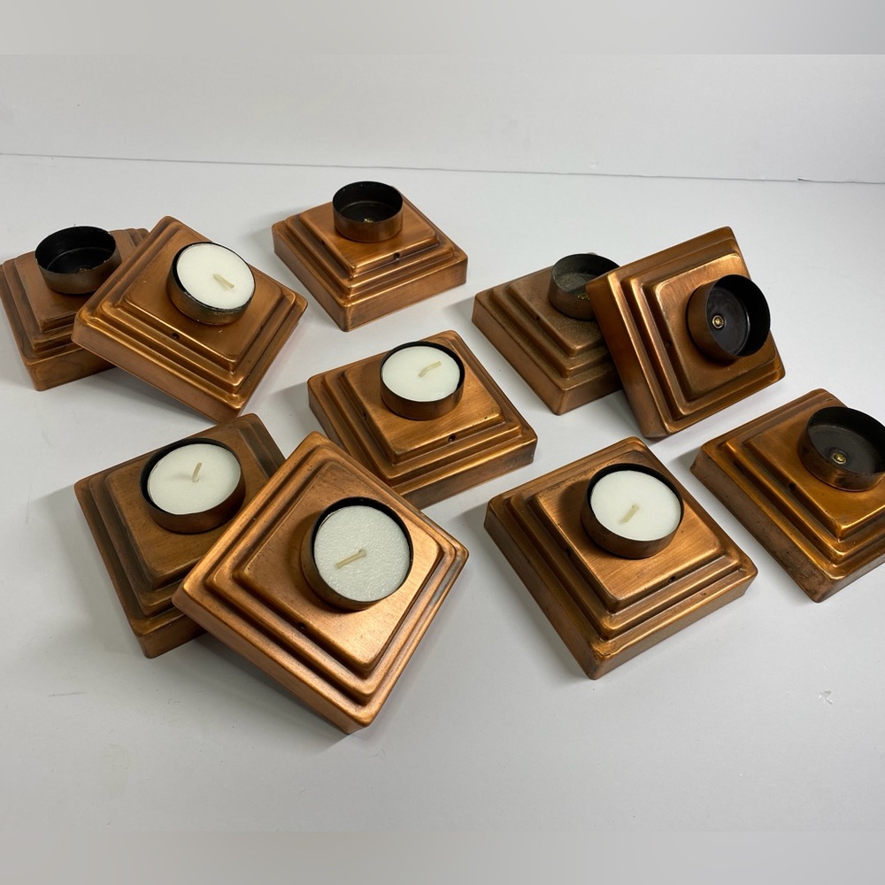 10 copper Tea light candle stands.